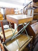 A MID 20TH CENTURY CHILD'S SLOPE TOP DESK HAVING INKWELL ALL RAISED ON METAL 'X' FRAME AND A WHITE