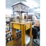 A NEST OF TWO SOLID LIGHTWOOD COFFEE TABLES, THE SMALLER ONE WITH A DRAWER AND AN OAK SMALL SIDE