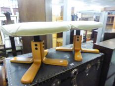 A PAIR OF MODERN STOOLS WITH UPHOLSTERED SEATS, ON BEECH BENT WOOD FOUR SPUR BASES (AS NEW)