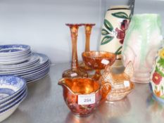A SMALL GROUP OF ORANGE LUSTRE GLASS ITEMS TO INCLUDE; A COCKEREL ON A BASKET BASE, A PAIR OF