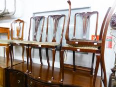 A SET OF FOUR MAHOGANY DRAWING ROOM SINGLE CHAIRS WITH PIERCED SPLAT BACKS, SLENDER CABRIOLE FRONT