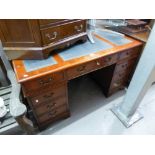 A MAHOGANY DOUBLE PEDESTAL DESK, WITH LEATHER INSET TOP, 4'6" WIDE