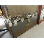 A LARGE FIBRE AND METAL BOUND CABIN TRUNK