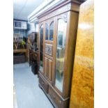 WALNUTWOOD WARDROBE WITH CENTRE CARVED AND GLAZED DOOR FLANKED BY TWO MIRROR DOORS, 4' WIDE