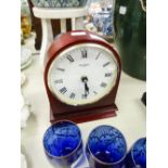 Wm WIDDOP MAHOGANY MANTEL CLOCK, WITH QUARTZ MOVEMENT IN MILESTONE SHAPED CASE, 8" HIGH