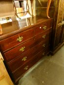AN EARLY 19TH CENTURY MAHOGANY CHEST OF TWO SHORT AND THREE GRADUATED LONG DRAWERS, ON BRACKET FEET,