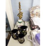 A 1950's CAST BRASS ELECTRIC TABLE LAMP, ALSO A SET OF THREE BLACK GLAZED JUGS AND A REPRODUCTION