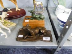 BRONZE CASED MODEL OF A GREYHOUND ON A RUG, SIGNED WITH INITIALS O.F.A., 7 3/4" long AND A GREEN