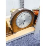 A GARRARD OAK MANTEL CLOCK AND AN ACCTIM ANNIVERSARY CLOCK (2)