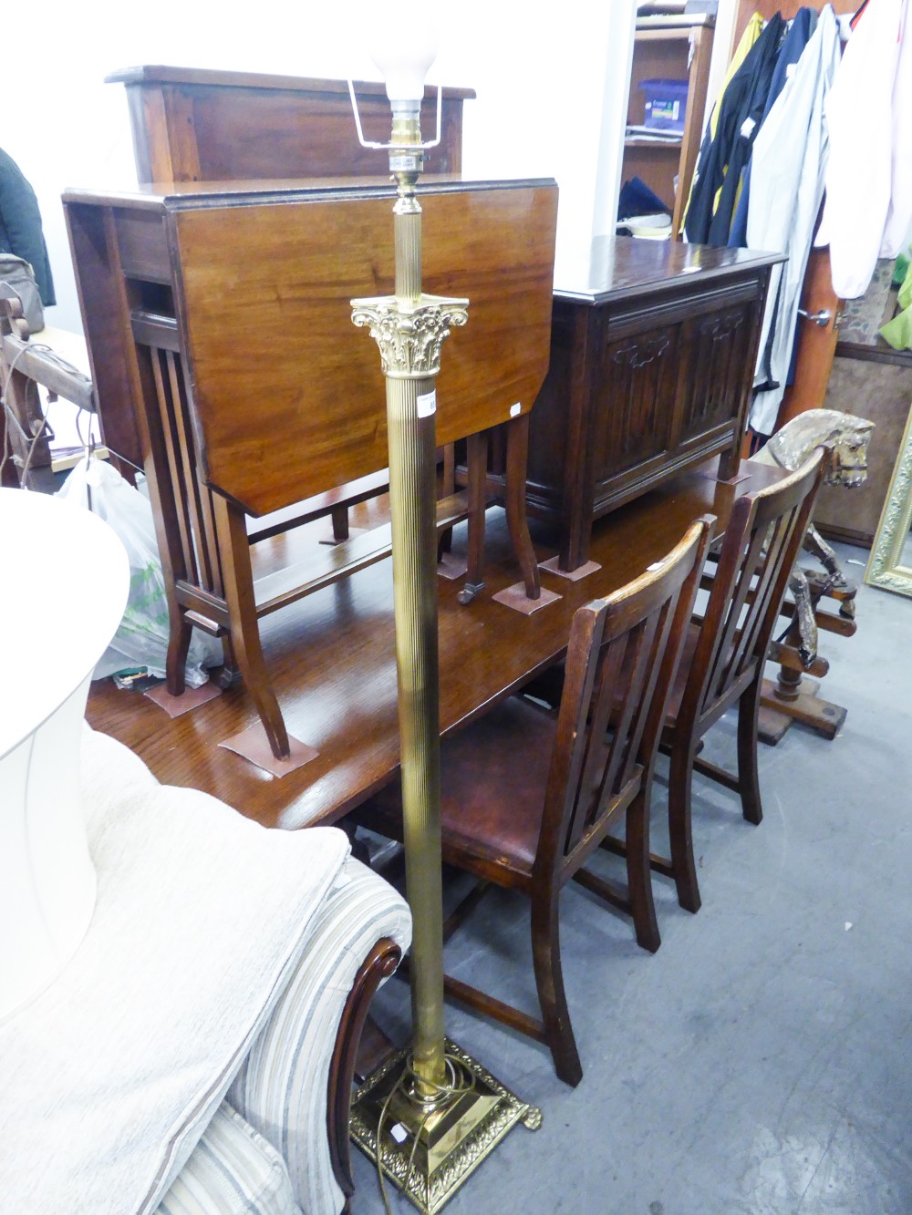 A BRASS STANDARD LAMP WITH REEDED COLUMN, ON SQUARE BASE WITH SILK SHADE