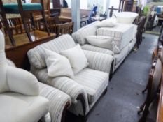 A WADE THREE PIECE SUITE HAVING WOODEN FRAME AND PADDED THROUGHOUT WITH STRIPED UPHOLSTERY