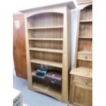 A HARDWOOD ARTS AND CRAFTS STYLE OPEN BOOKCASE OF SIX TIERS WITH FIXED SHELVES, 3'6" WIDE