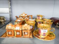 A COTTAGE WARE TEA SERVICE AND CONDIMENT SET AND A STAFFORDSHIRE TEA SET OF SIX PERSONS