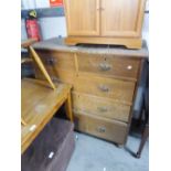 A LATE VICTORIAN OAK CHEST OF DRAWERS