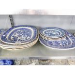 FIVE NINETEENTH CENTURY WILLOW PATTERN STAFFORDSHIRE LARGE MEAT DISHES AND FOUR WILLOW PATTERN