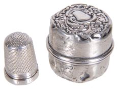 An Edwardian silver thimble with embossed pendant case, hallmarked Birmingham 1904,