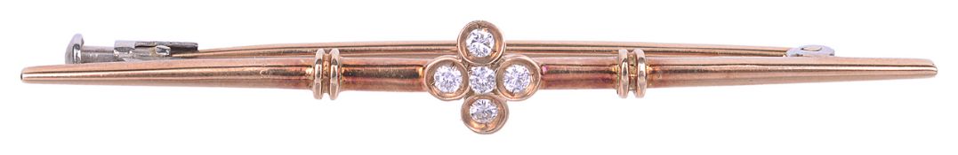 A delicate Continental .585 gold and diamond bar brooch