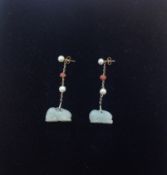 A pair of contemporary carved jade 'rabbit' drop earrings