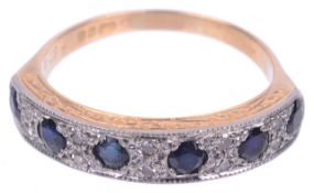 A sapphire and diamond half eternity ring