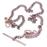 An Edwardian 9ct rose gold watch Albert chain