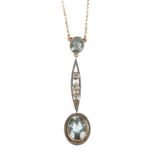 A delicate Edwardian aquamarine and diamond pendant necklace,