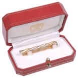 An 18ct Cartier tri-coloured braided tie clip