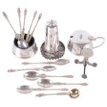 A collection of silver cruets, teaspoons and other silver ware