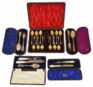 A collection of five cases of Victorian silver flatware including teaspoons and christening sets