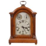 A late 19th century oak cased bracket clock