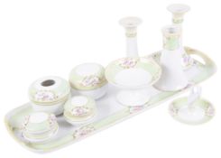 A Japanese Noritake porcelain ten piece dressing table suite,