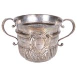 A Queen Anne Britannia silver porringer by John Cory, hallmarked London 1706