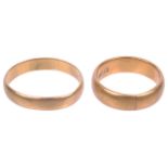 Two 22 carat gold wedding bands