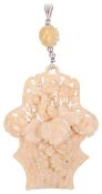 A Victorian/Edwardian carved ivory floral basket pendant