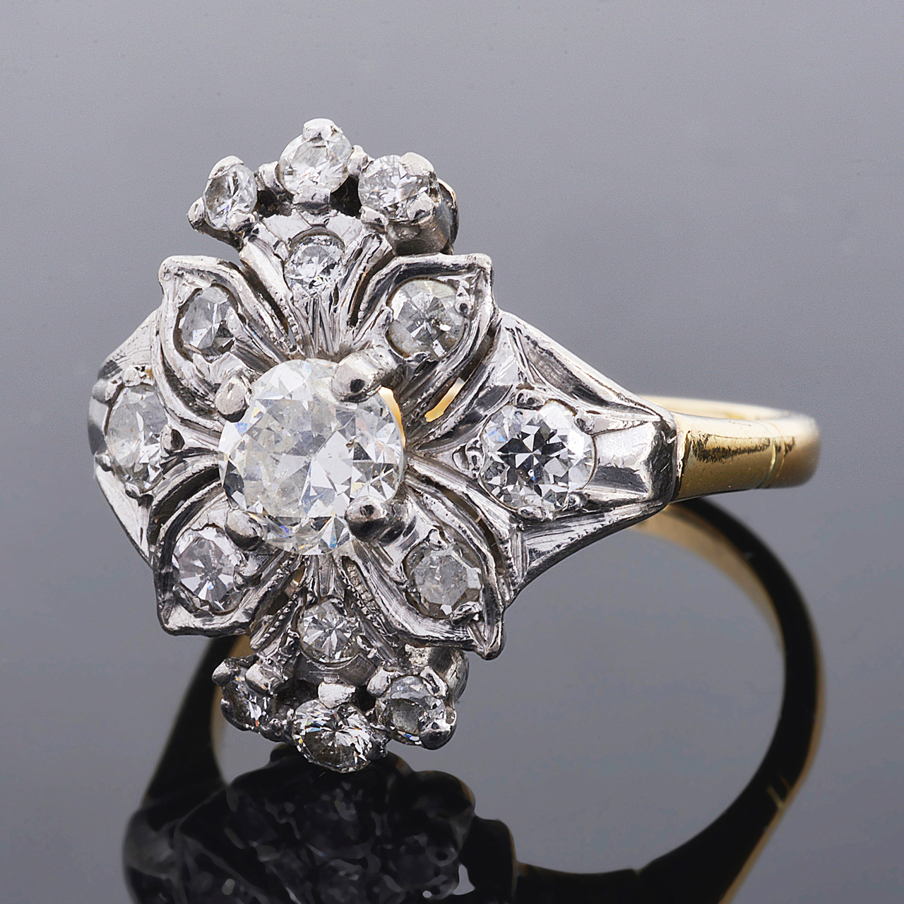 A 1940's diamond set fancy floral cluster cocktail ring