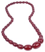 A graduated cherry red amber bead necklace