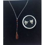 A delicate Art Deco carnelian pendant on chain and a pair of amusing 'fox' earrings