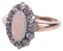An attractive Edwardian opal and diamond marquis shaped cluster ring