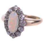 An attractive Edwardian opal and diamond marquis shaped cluster ring