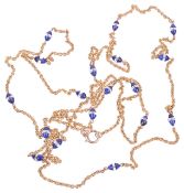 A fine Edwardian gold, lapis lazuli and rock crystal bead longuard chain,