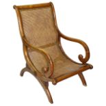 A William IV mahogany caned armchair,