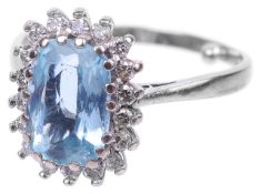 A mid 20th century aquamarine and diamond set cluster ring