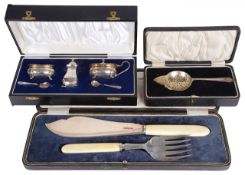 A boxed set of silver and ivorine fish knife and fork, hallmarked Sheffield 1919 by Allen & Darwin;