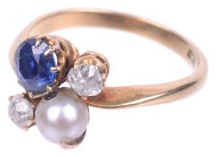 An attractive Edwardian sapphire, diamond and pearl set ring