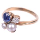 An attractive Edwardian sapphire, diamond and pearl set ring
