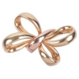 A Continental 18ct gold two colour 'tied' ribbon bow brooch