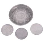 Three Chinese silver dollars and a Chinese silver dish inset with a Chinese dollar,