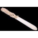 A late 19th century finely carved ivory paper knife