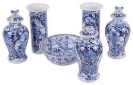 A late 19th century Chinese blue and white porcelain 'garniture',