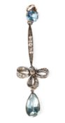 A delicate Edwardian aquamarine and diamond ribbon drop pendant