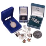 A collection of mixed silver jewellery